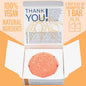 EPS bee hive shaped shampoo bar in white box with natural ingredients and vegan labels