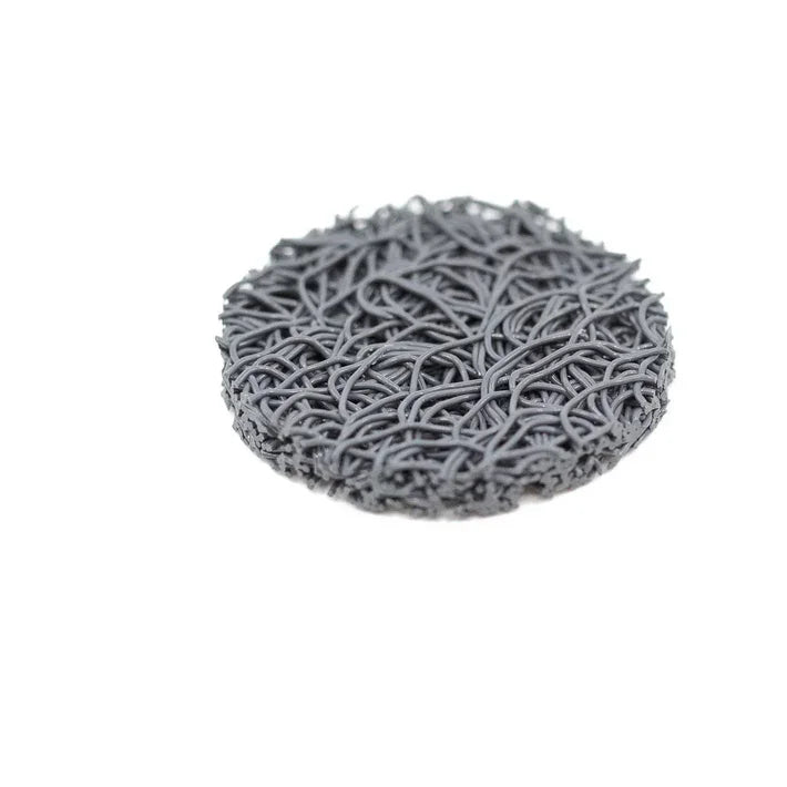 Close-up of a round gray EPS bee hive with an intricate tangled design on a white background