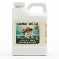 White 16 fl oz bottle of Swamp Nectar Honey Bee Supplement featuring a bee on a water lily.