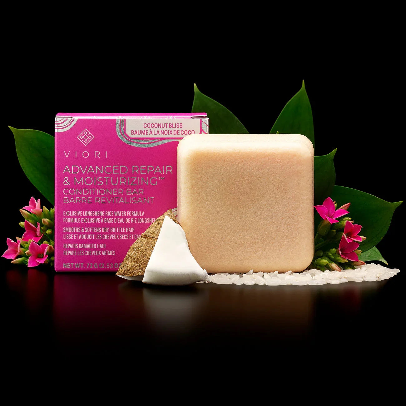 Viori Advanced Repair & Moisturizing conditioner bar with coconut slice, rice grains, and pink flowers on black background